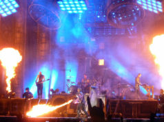 Rammstein on stage at Download Festival 2013 with Till Lindemann "cooking alive" Keyboard player Flake