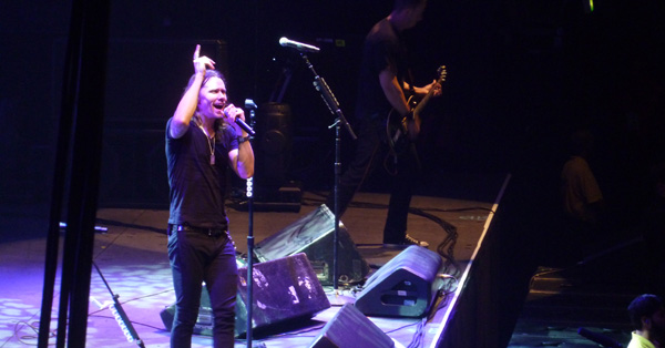 Myles Kennedy of Alter Bridge on stage at Wembley Arena October 2013