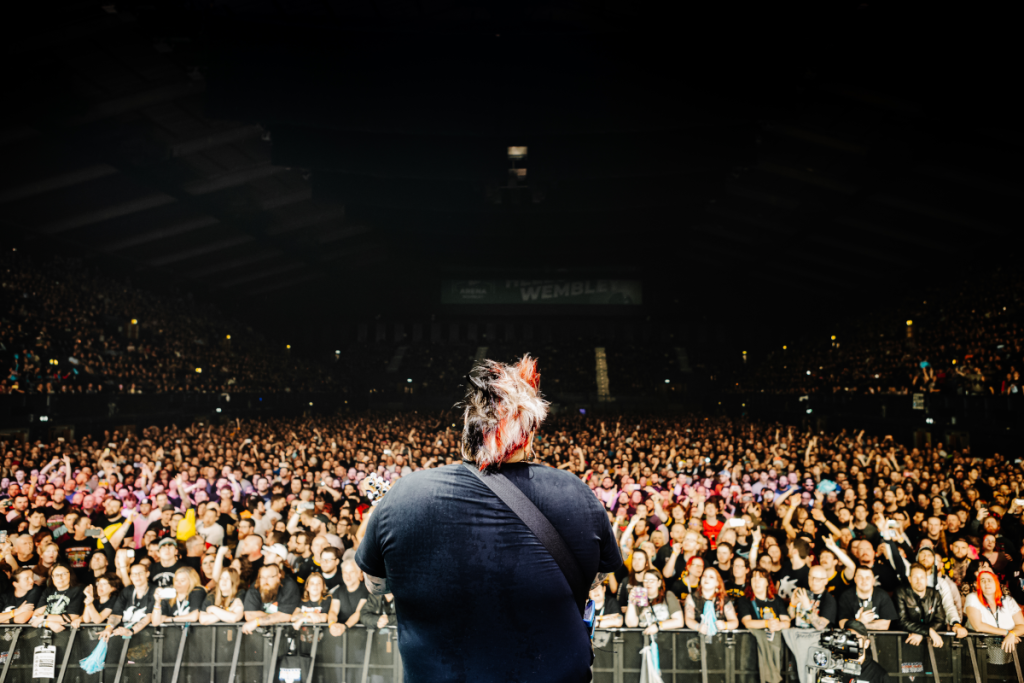 Jaret Reddick of Bowling For Soup on stage at Wembley Arena, December 2025, by Amy Russell.